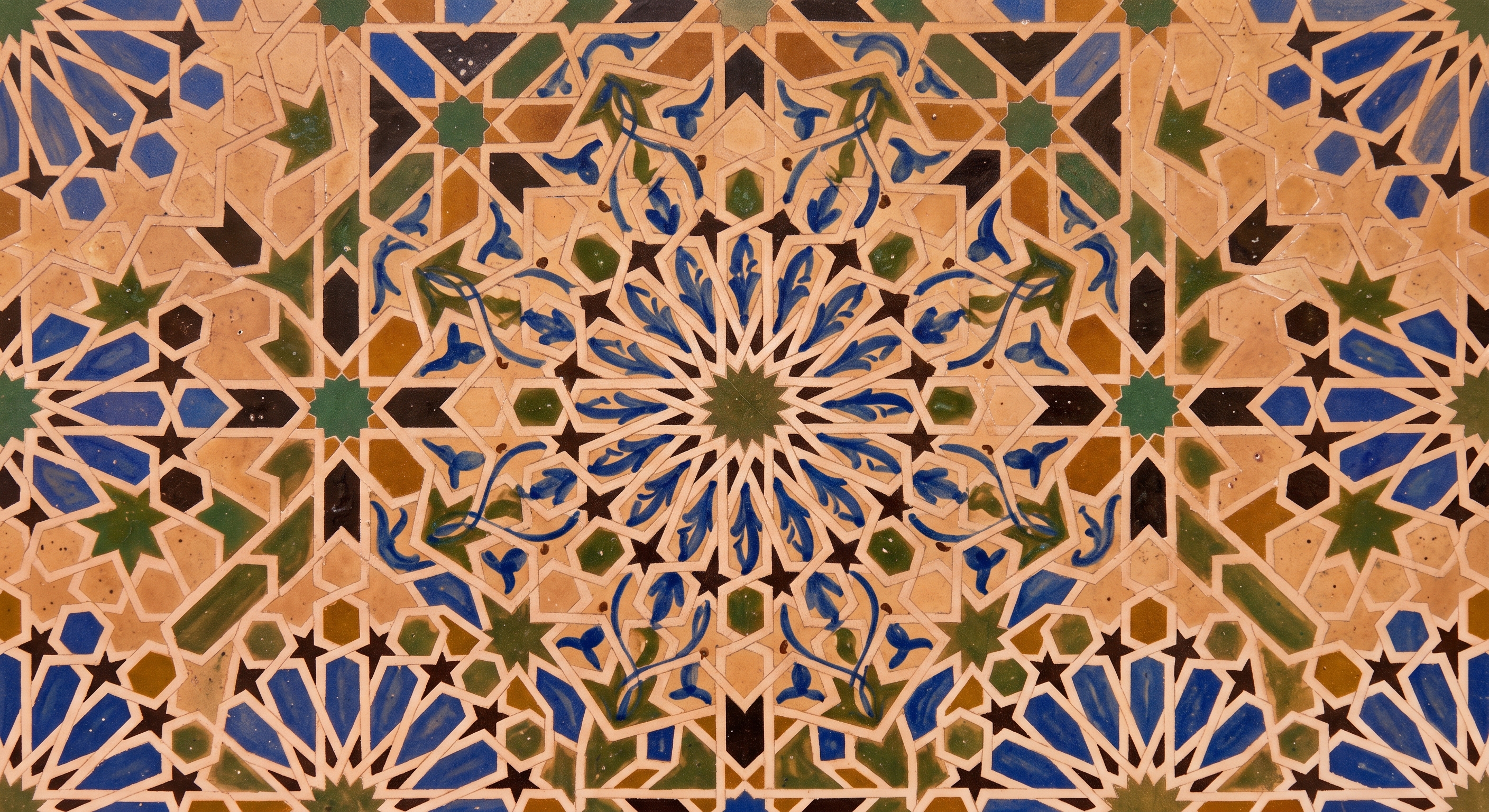 Hand-painted floral arabesque motif on a Safi ceramic piece